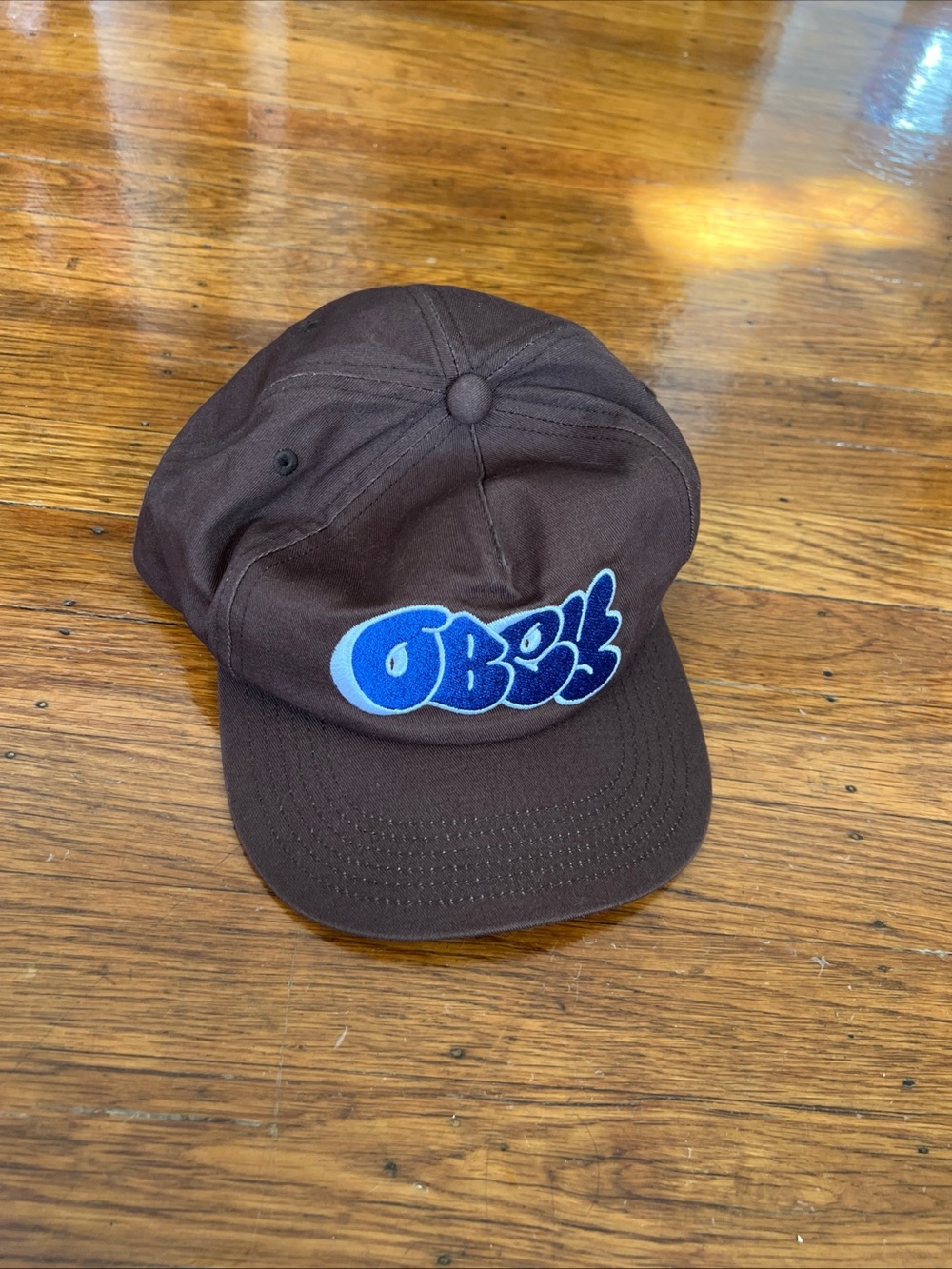 Obey Brown Cap with Blue Logo Tag Streetwear
